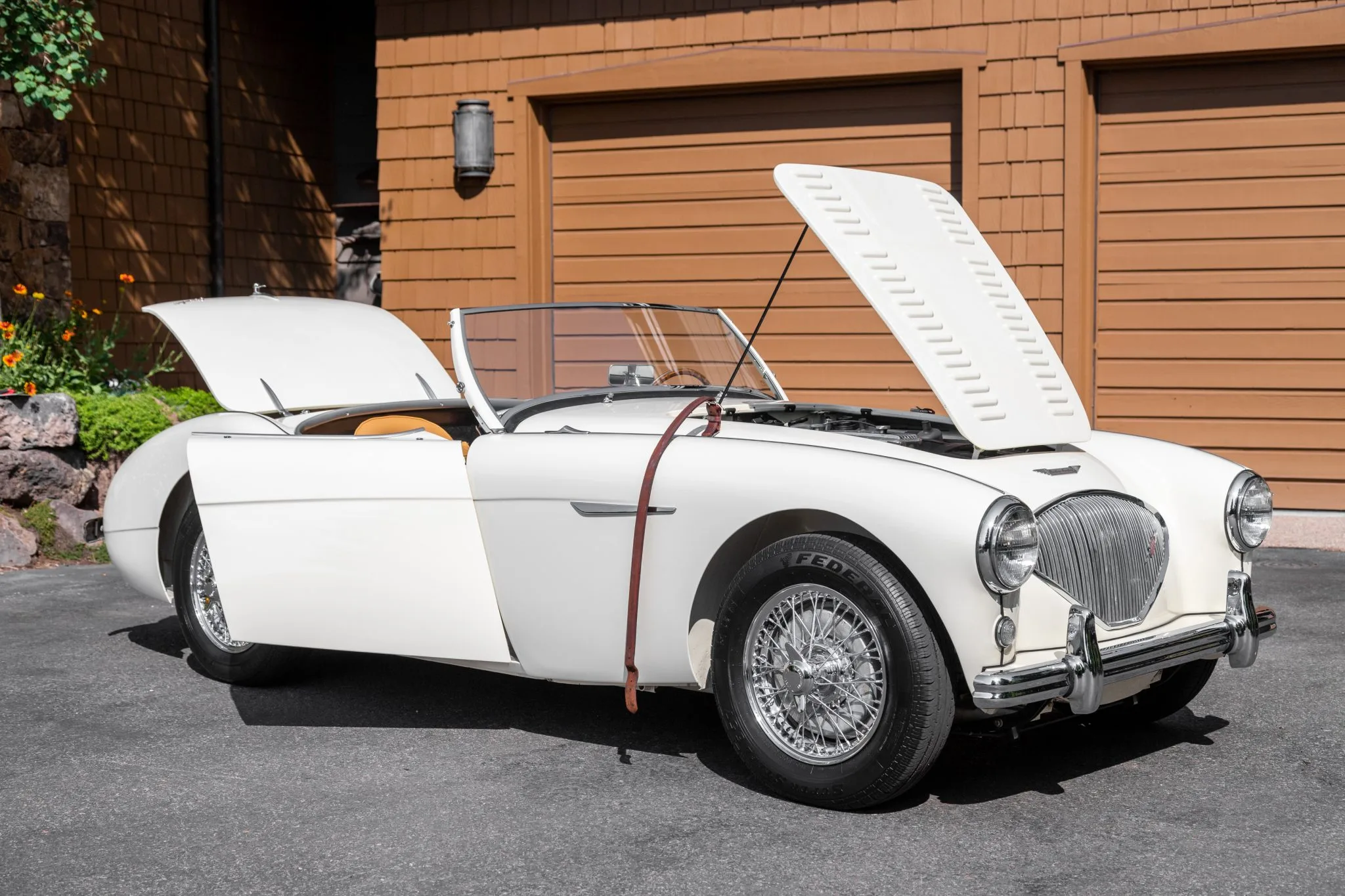 1956_austin-healey_100_bn2_roadster_16285415426e7dff9f98764da1956_austin-healey_100_bn2_roadster_16285415418495d565ef6bd5a7e09-1392-45b5-b525-2dc73b86ab1b-CSUDx8-scaled